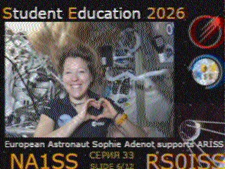 Decoded SSTV picture from the ISS: European astronaut Sophie Adenot smiling and making a heart with her hands on board the station, headed “Student Education 2026” and captioned “European Astronaut Sophie Adenot supports ARISS”.